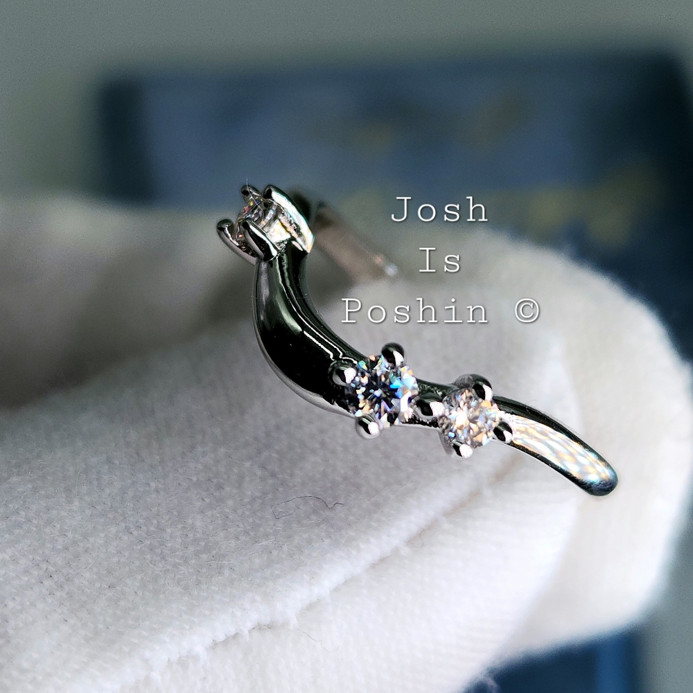 0.13CTW Moissanite ring band in rhodium over sterling silver
